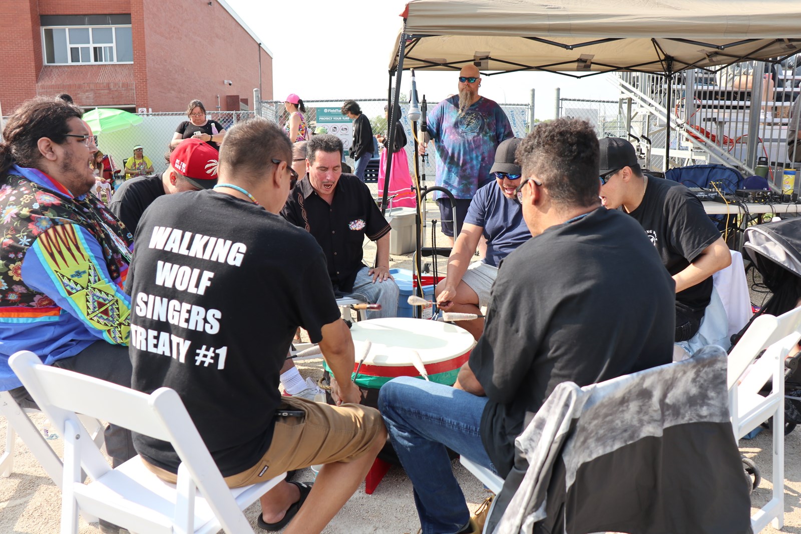 Walking Wolf Singers Host Drum