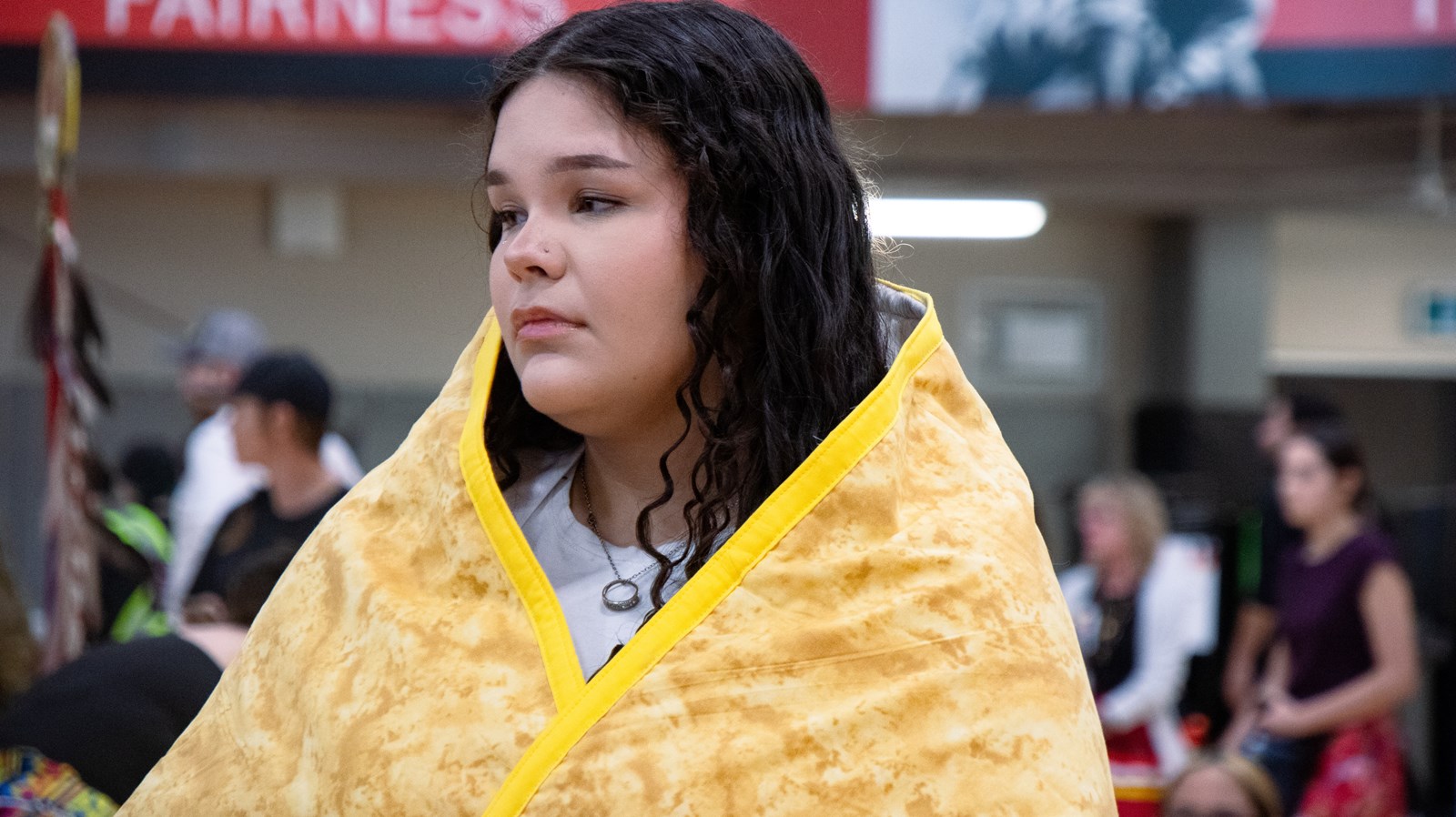 Jordyn Hastings wrapped in a yellow Starblanket