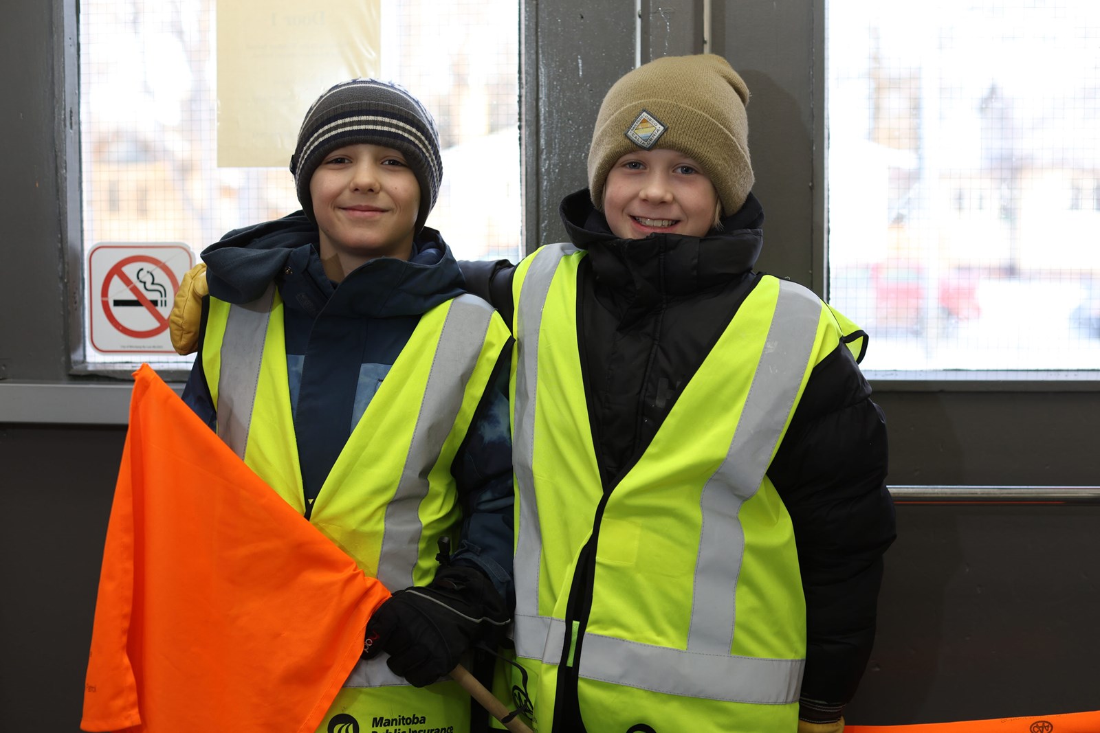 A crossing guard helping children