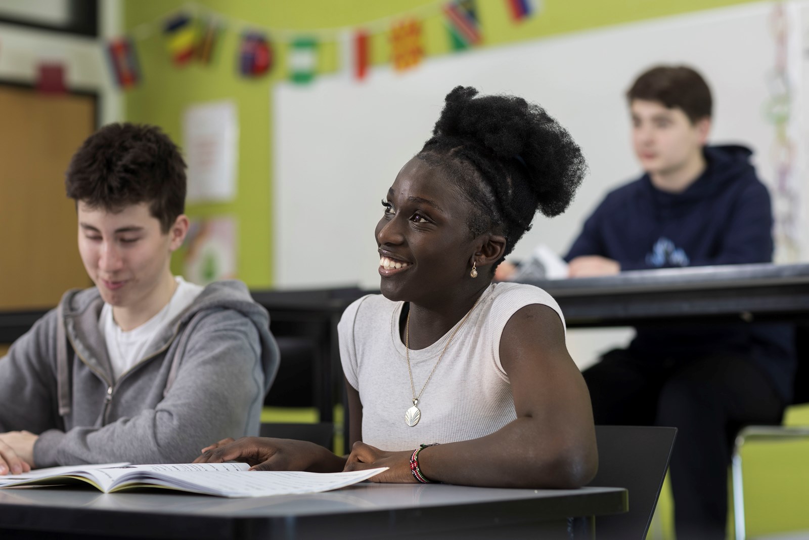 students smiling in class
