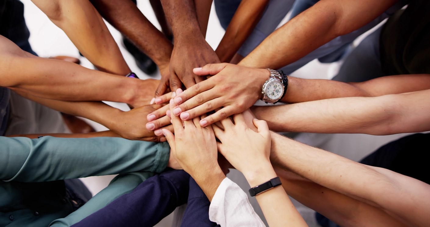 A group of diverse people smiling