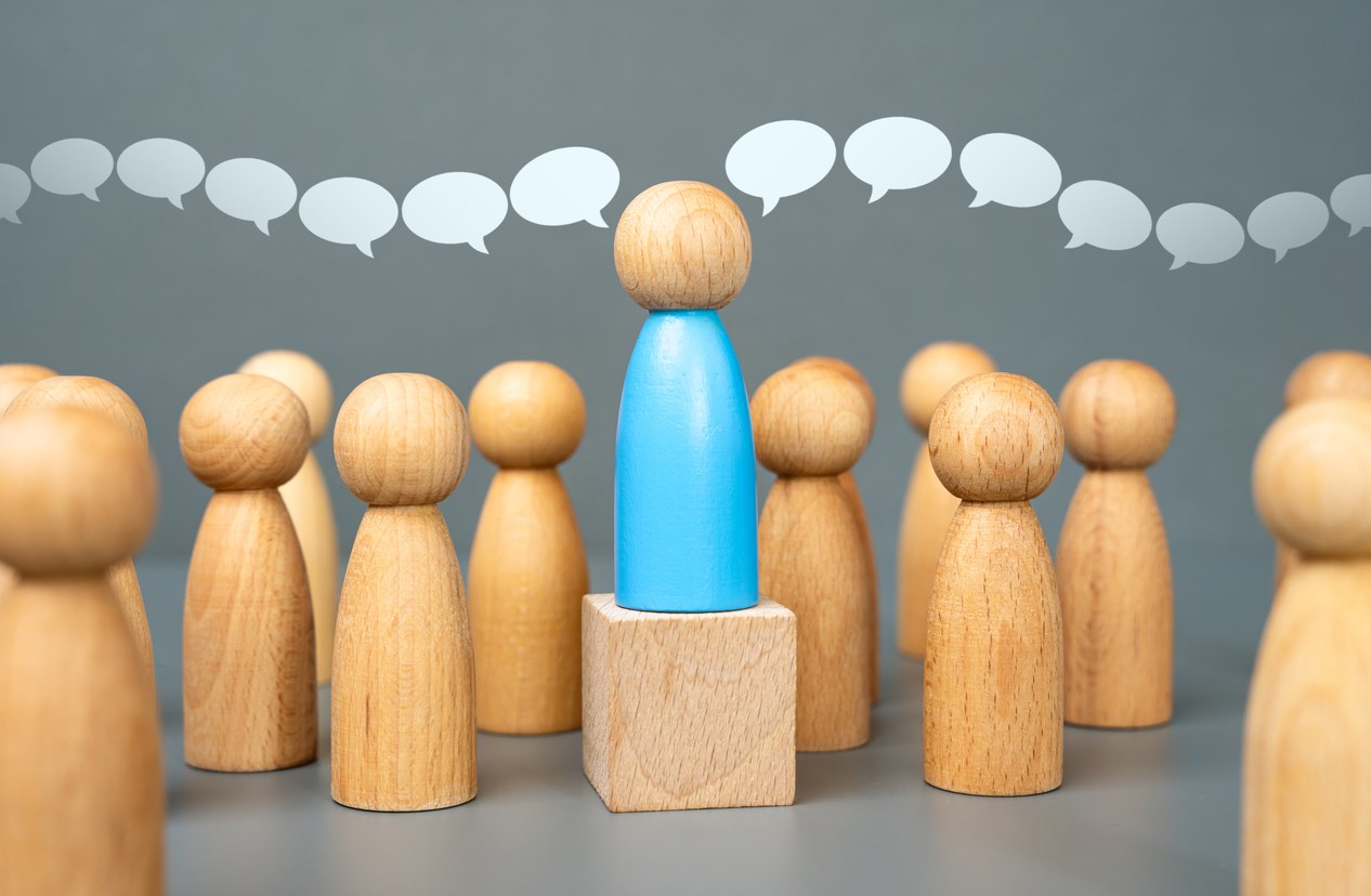 A person speaking at a forum