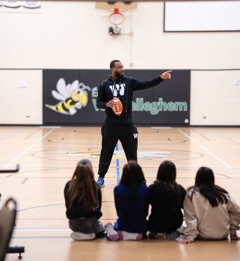 Brandon Alexander at École Van Belleghem teaching flag football