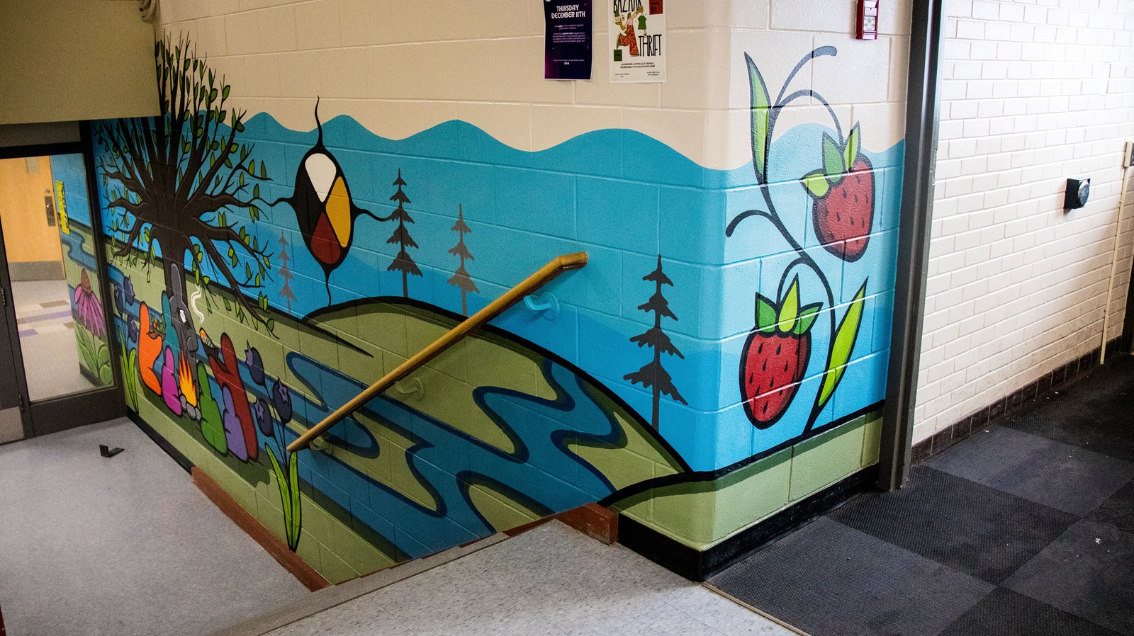 Mural leading down the stairs to WPC's community room