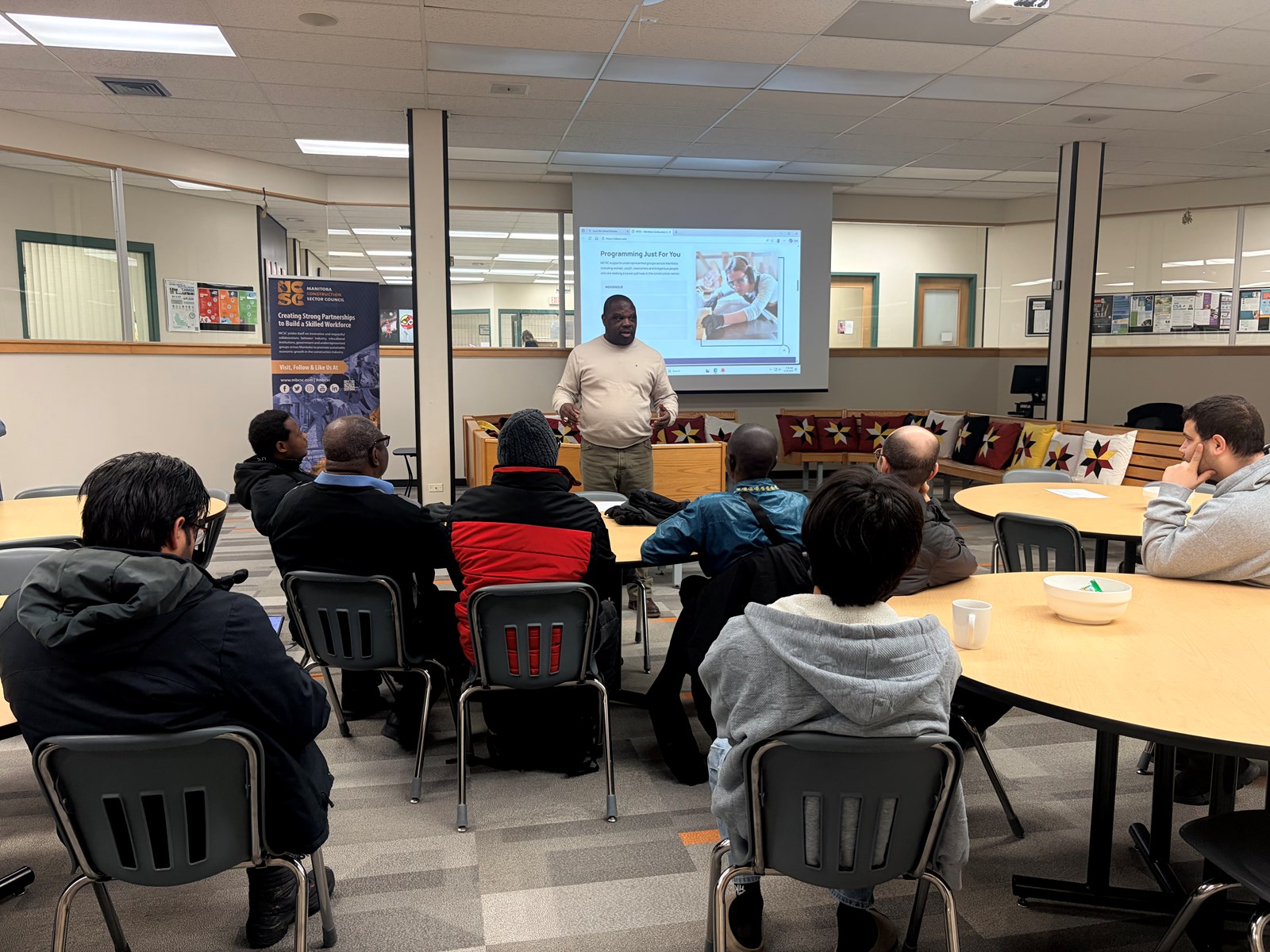 In the picture is former Blue Bomber James Murphy, now an Education and Training Manager for the Manitoba Construction Sector Council leading the session for adult caregivers