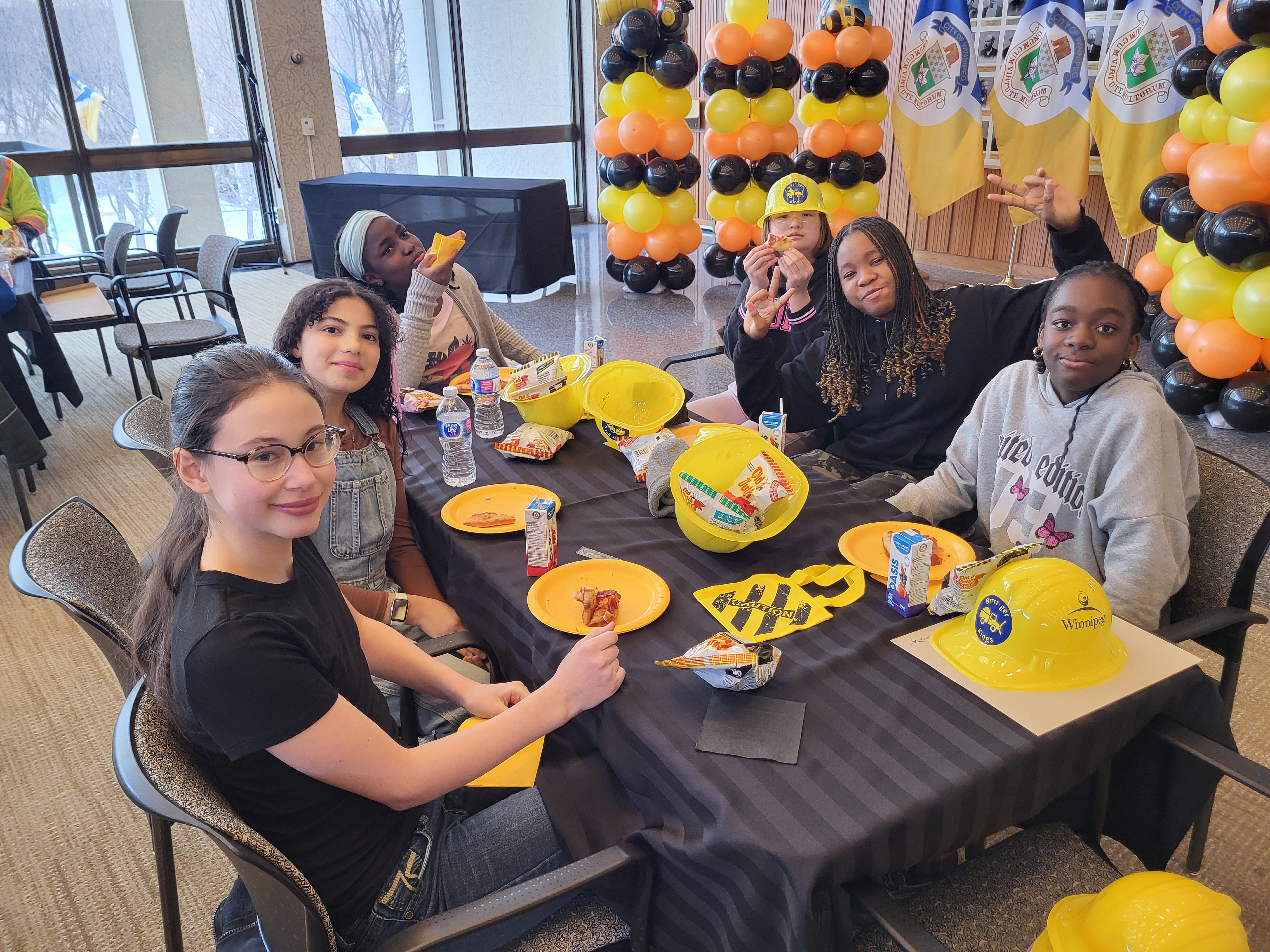 The winning team, proud smiles